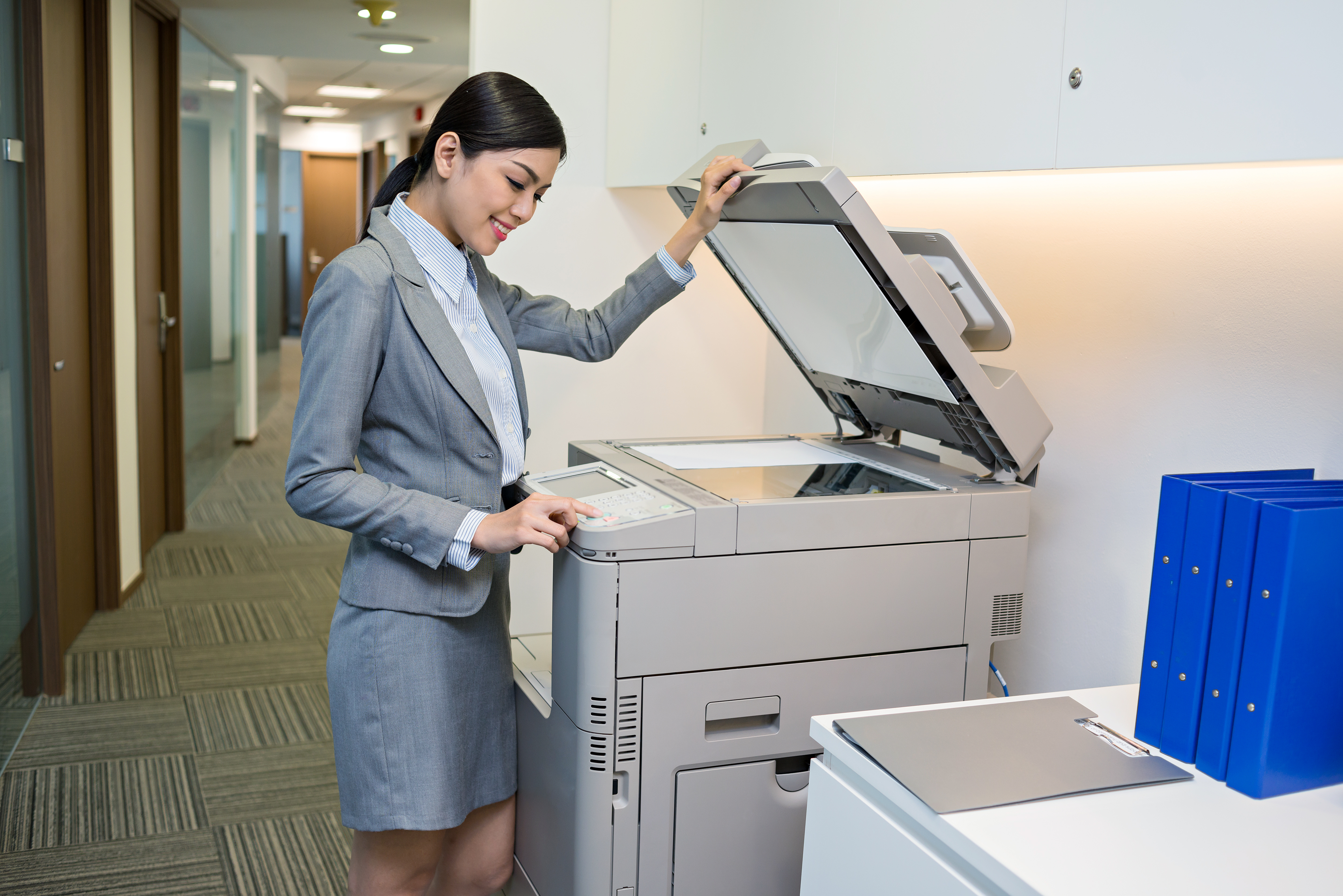 Modern Saskatchewan office showcasing popular office equipment including multifunction printers, copiers, and production systems used by Vonex Business Solutions clients